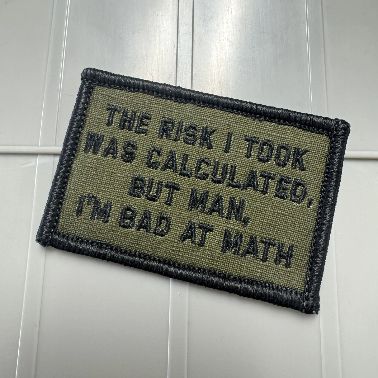 As Seen on Socials - The Risk I Took Was Calculated, But Man, I'm Bad At Math - 2x3 - Multiple Variants in Desert Tan