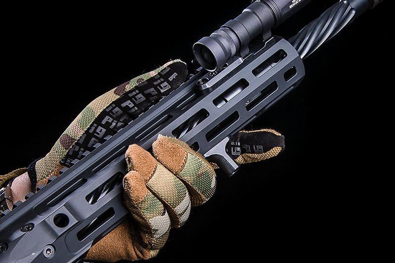 Arisaka Finger Stop M-Lok in black positioned between a gloved support hand