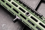 Black Arisaka Finger Stop M-Lok installed on an olive drab M-Lok handguard