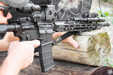 Arisaka Finger Stop M-Lok in black installed on an M-Lok handguard at a shooting range