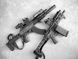Arisaka Hand Stop M-Lok in black shown installed on two rifles