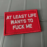 As Seen on Socials - At Least Life Wants To Fuck Me - Red w/Silver