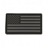 Black and gray American flag PVC patch on a white background