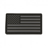 Black and gray American flag PVC patch on a white background