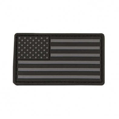 Black and gray American flag PVC patch on a white background
