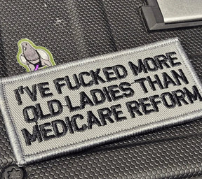 ASOS - I've Fucked More Old Ladies Than Medicare Reform - 2x4 Patch - Gray w/Black