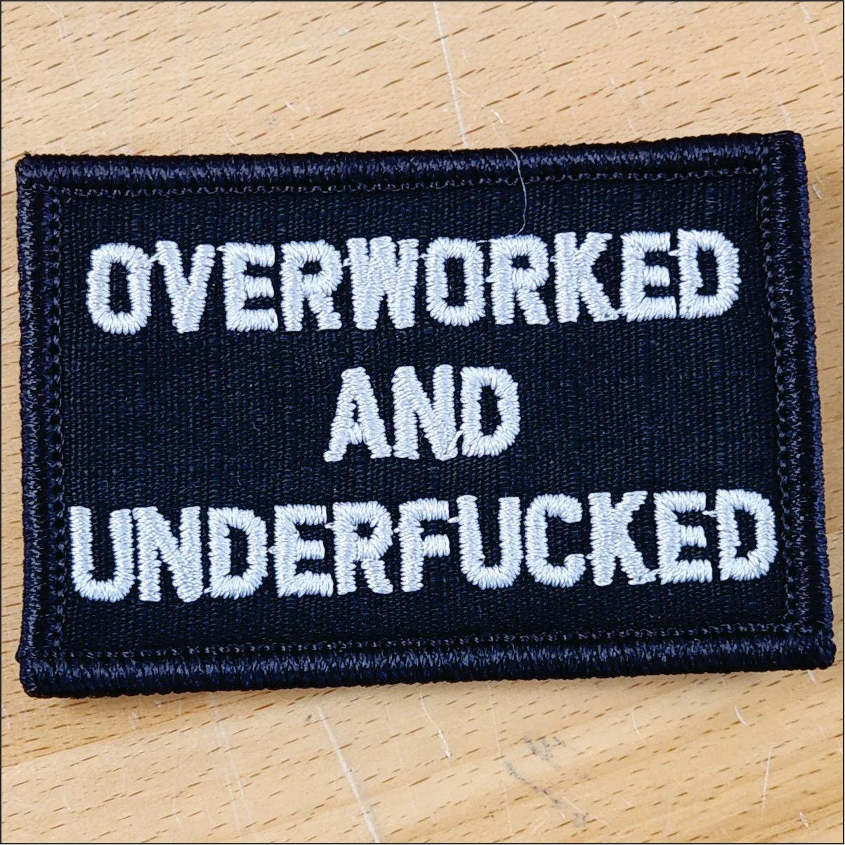 As Seen on Socials - Overworked and Underfucked - 2x3 Patch in Black w/Red, alternate view 2