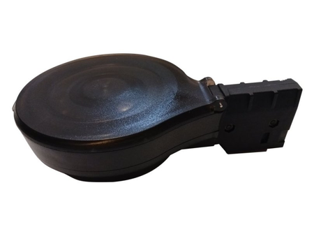 Side view — Tempest 32-round drum magazine with feed neck