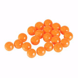 Pile of T4E .43 caliber orange paintballs